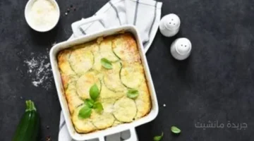 طاجن الكوسة بالبشاميل والدجاج خطوة واحدة تضمن لك قوامًا كريميًا ونكهة لا تقاوم. 1